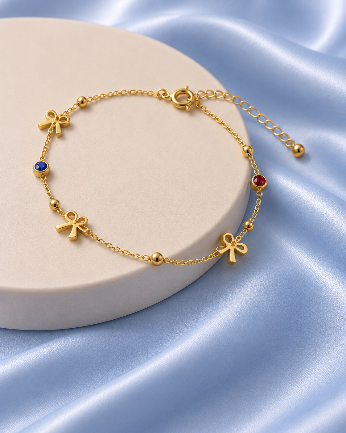 Enchanted Bow & Gemstone Gold Bracelet