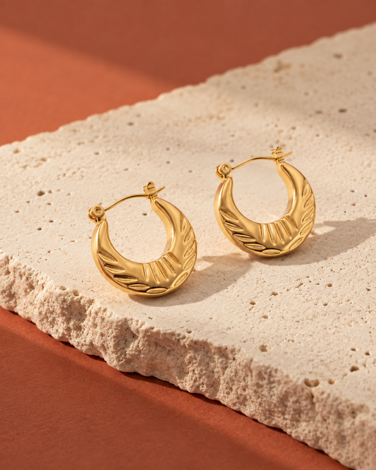 Golden Feather-Carved Brass Hoop Earrings