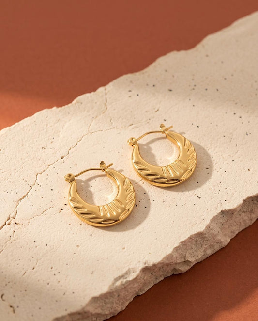 Golden Feather-Carved Brass Hoop Earrings